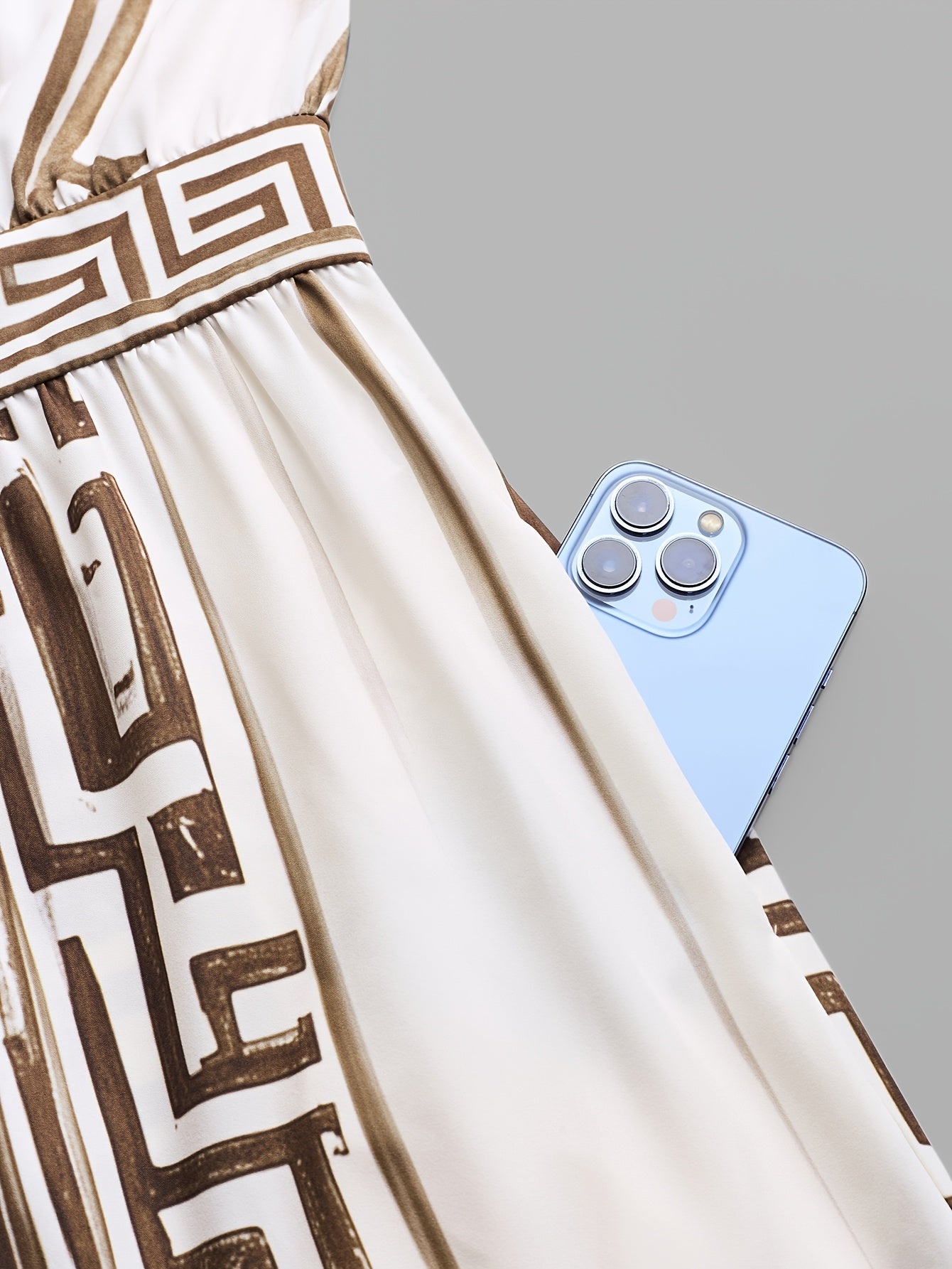 Liora™ | Geometric Print Halter Maxi Jumpsuit