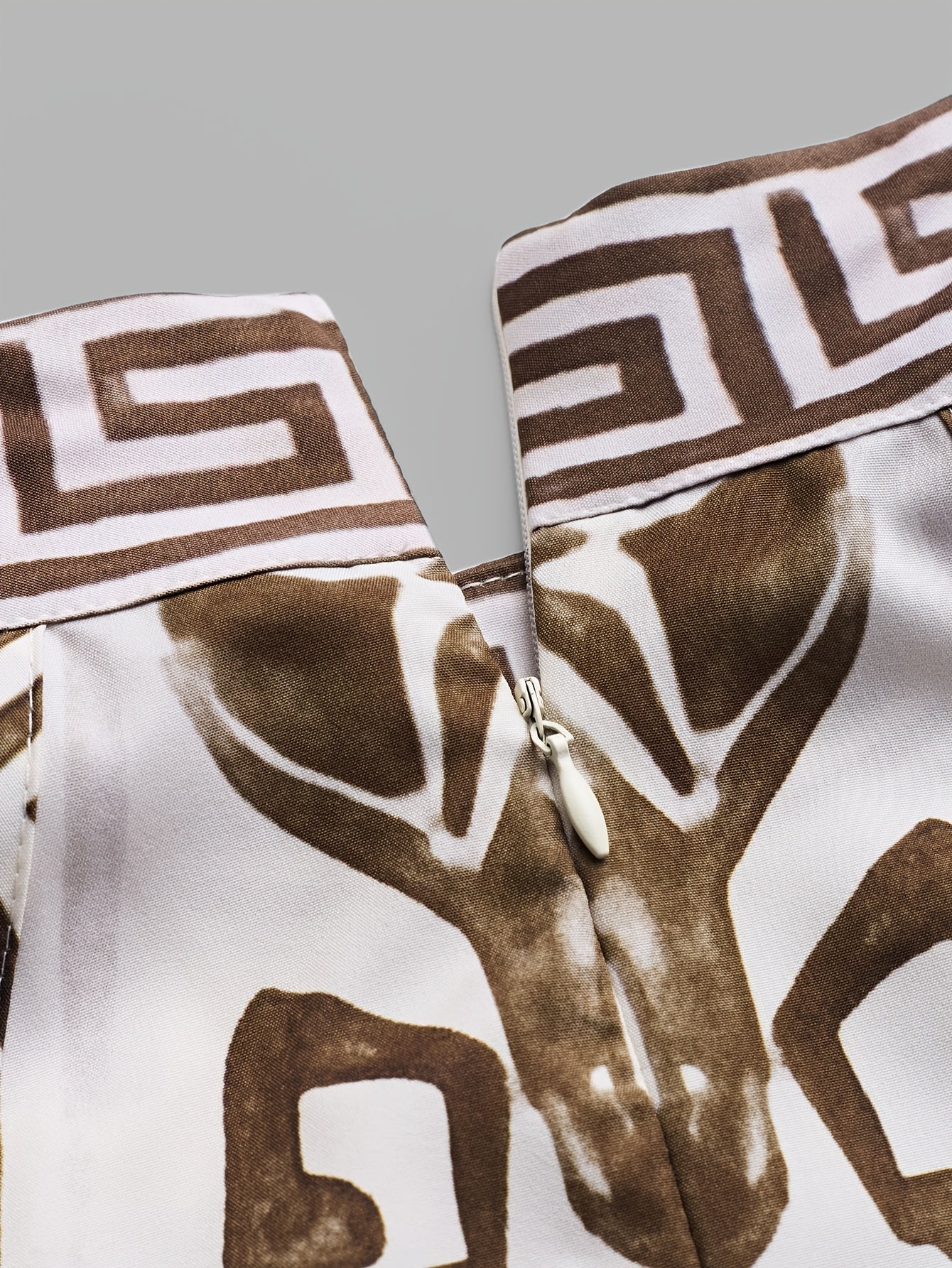 Liora™ | Geometric Print Halter Maxi Jumpsuit